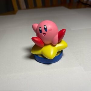 Pink Kirby Amiibo on Yellow Star